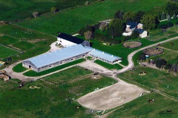 Birds eye view of a horse riding and boarding facility in Cookstown